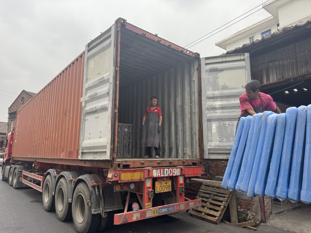 Mixed bathroom container order with vanities, basins, mirrors and bathroom accessories prepared for quality inspection and export packing